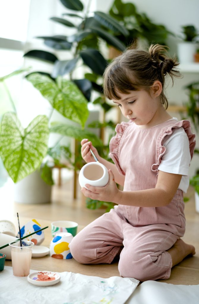 Kid DIY pot painting hobby at home
